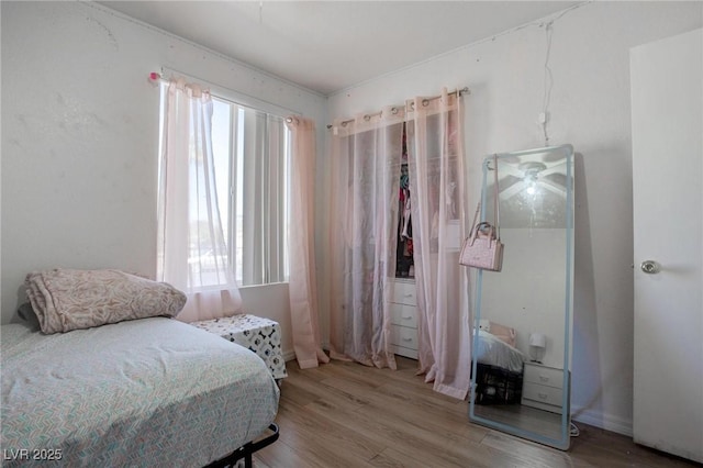 bedroom with light wood-style flooring