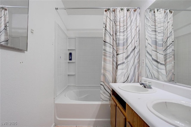 full bath featuring double vanity, a sink, and shower / bathtub combination with curtain