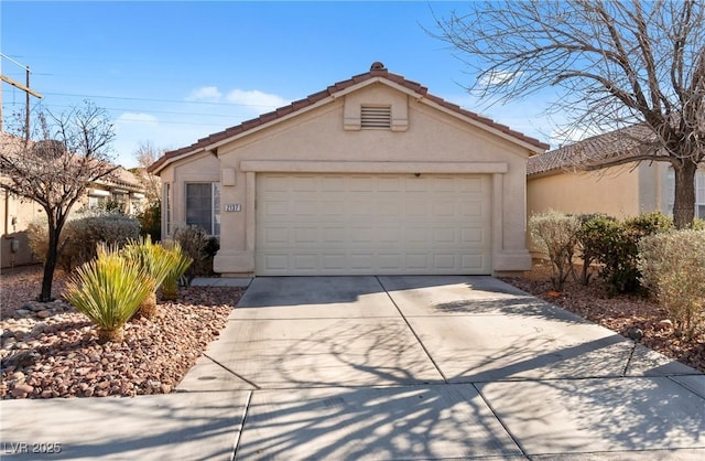 garage featuring driveway