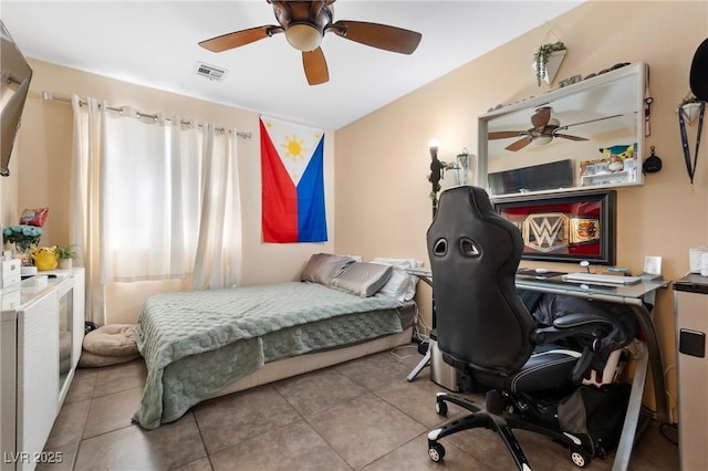 tiled bedroom with ceiling fan and visible vents