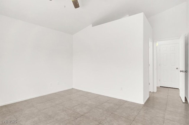 2137 Hidden Ranch Ter, Henderson, NV 89052 - spare room with ceiling fan, vaulted ceiling, and light tile patterned floors