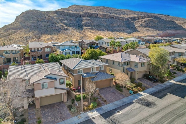 exterior space with a residential view and a mountain view