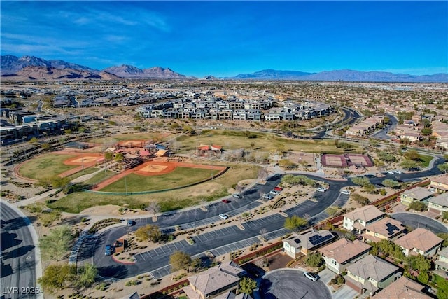 birds eye view of property with a residential view and a mountain view