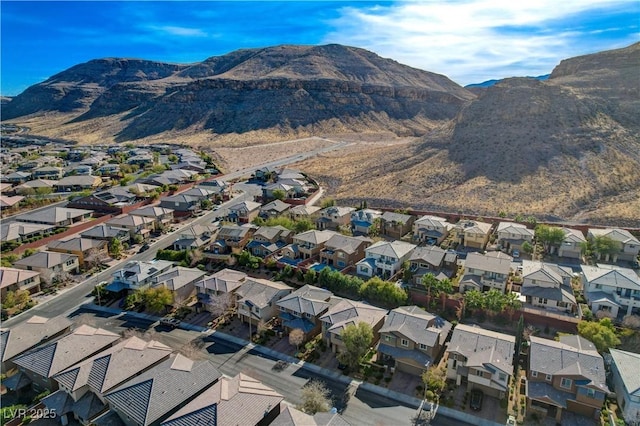 bird's eye view featuring a residential view and a mountain view