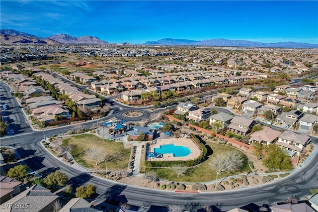 bird's eye view with a residential view and a mountain view