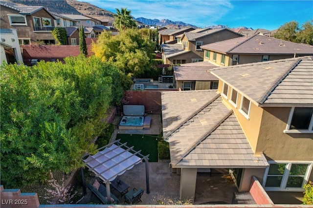 bird's eye view with a residential view and a mountain view