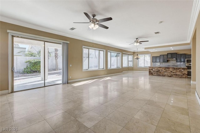 unfurnished living room featuring baseboards, visible vents, and ornamental molding