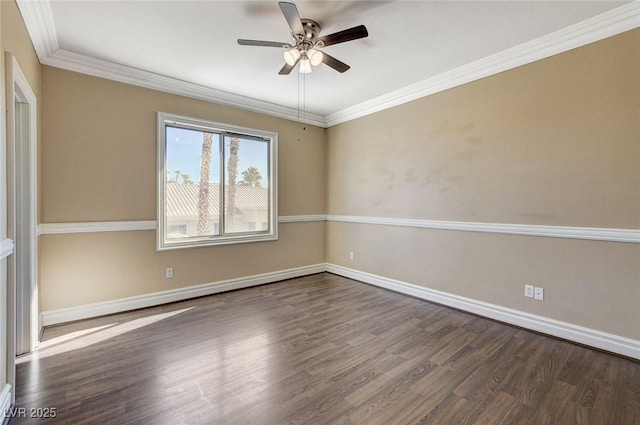 unfurnished room with ornamental molding, ceiling fan, baseboards, and wood finished floors