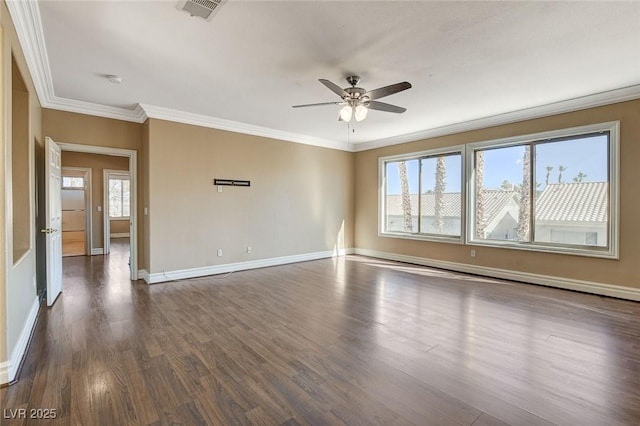 unfurnished room with plenty of natural light, visible vents, baseboards, and dark wood finished floors