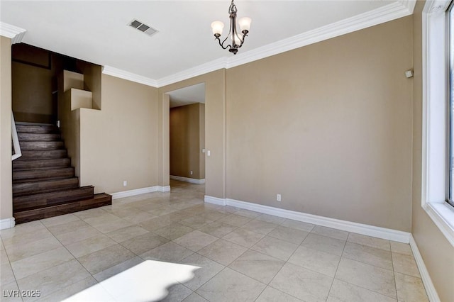 spare room with crown molding, visible vents, an inviting chandelier, baseboards, and stairs