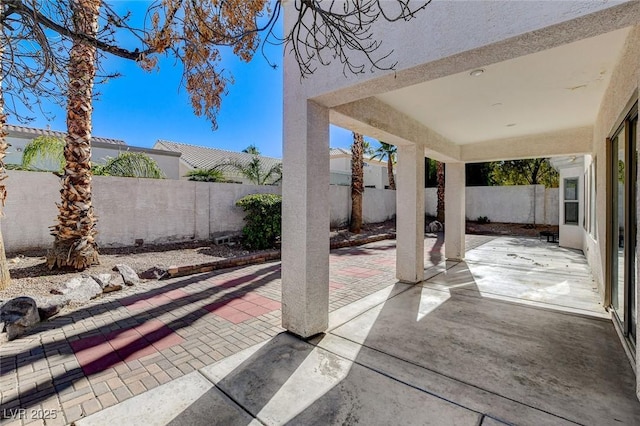 view of patio with a fenced backyard