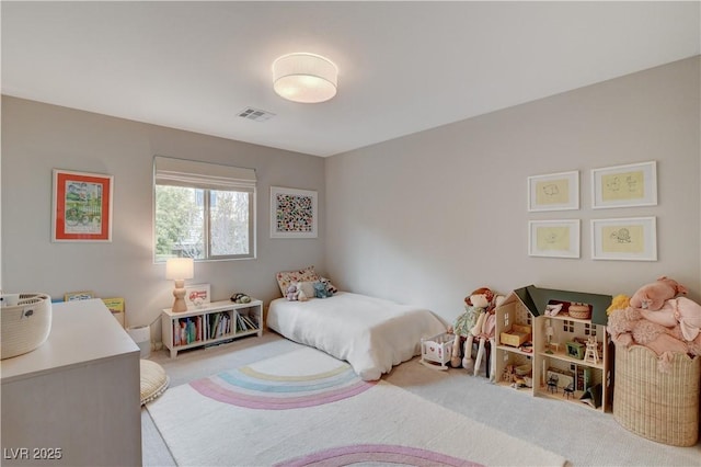 carpeted bedroom with visible vents