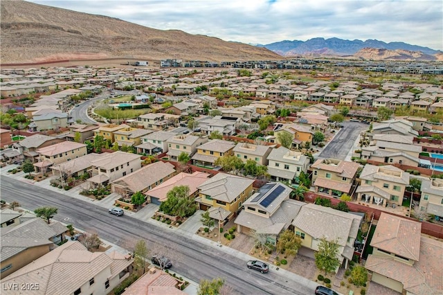 bird's eye view with a residential view and a mountain view