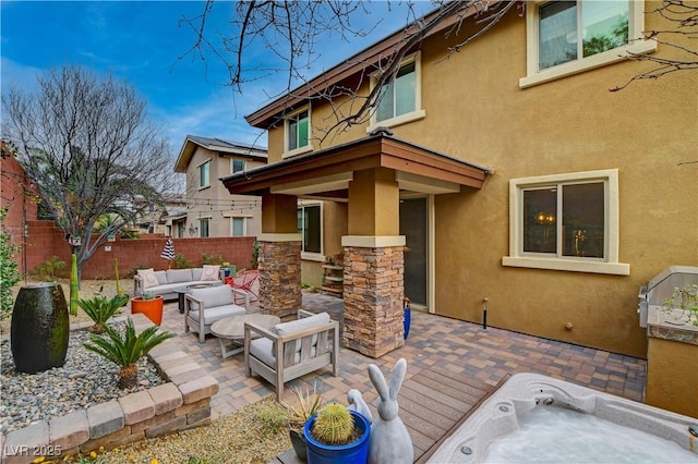 view of patio / terrace featuring fence and an outdoor living space