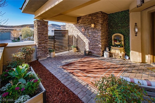 view of patio featuring a mountain view