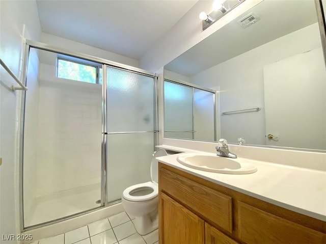 full bath with a stall shower, visible vents, toilet, tile patterned floors, and vanity