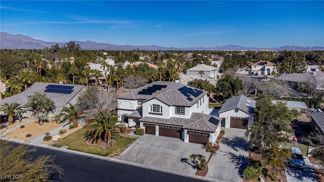 birds eye view of property with a residential view and a mountain view