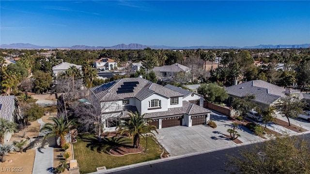 bird's eye view featuring a residential view and a mountain view