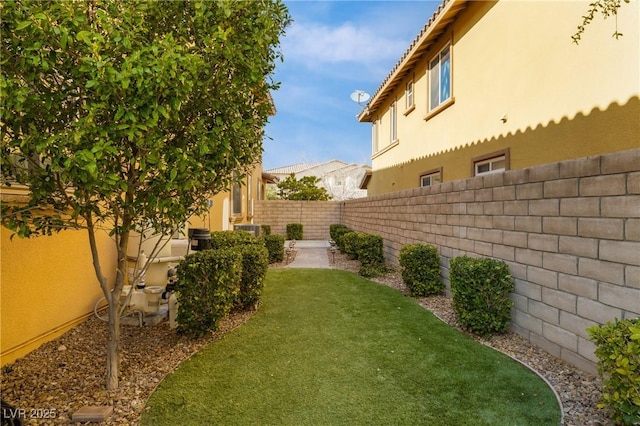 view of yard featuring a fenced backyard