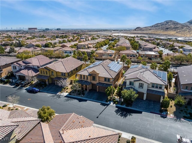 bird's eye view with a residential view and a mountain view