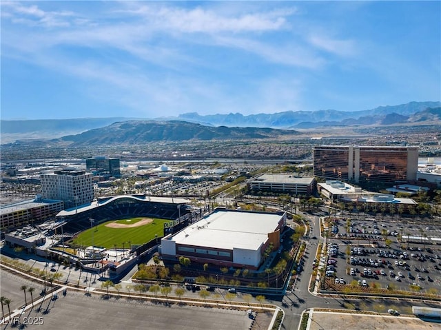 birds eye view of property featuring a mountain view