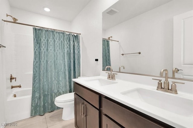 full bath featuring shower / tub combo with curtain, tile patterned flooring, a sink, and double vanity