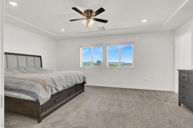 bedroom featuring light carpet, recessed lighting, visible vents, and baseboards