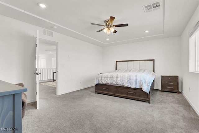 bedroom with light colored carpet, recessed lighting, and visible vents