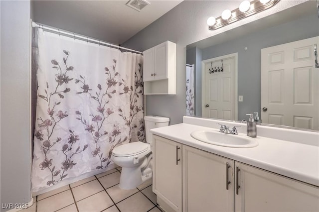 full bathroom featuring curtained shower, visible vents, toilet, vanity, and tile patterned floors