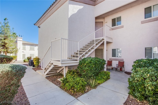 view of property with stairs