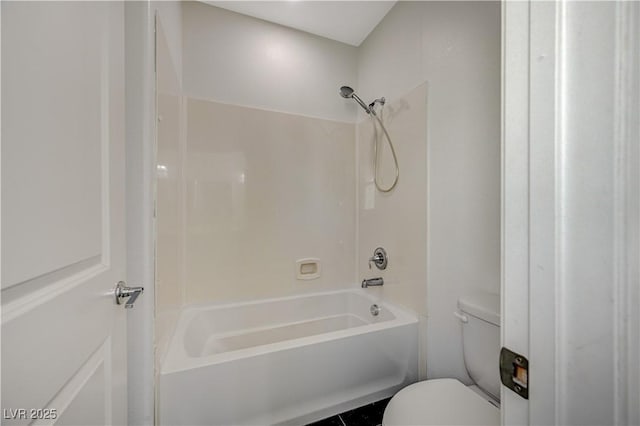 full bathroom featuring toilet and shower / bathtub combination