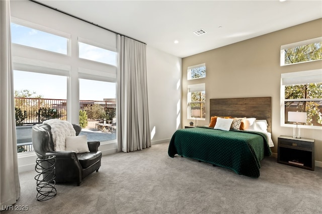 bedroom featuring carpet floors, baseboards, visible vents, and recessed lighting