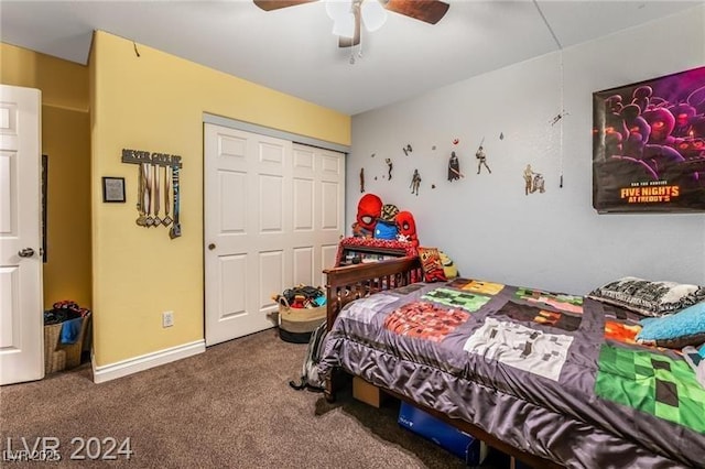 carpeted bedroom with a closet, ceiling fan, and baseboards