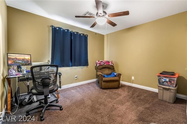 office featuring ceiling fan, baseboards, and carpet flooring