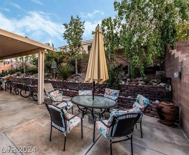 view of patio with fence