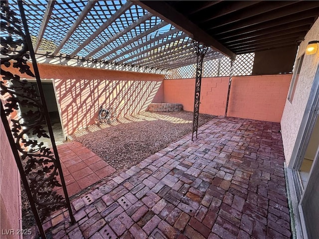 view of patio featuring a fenced backyard and a pergola