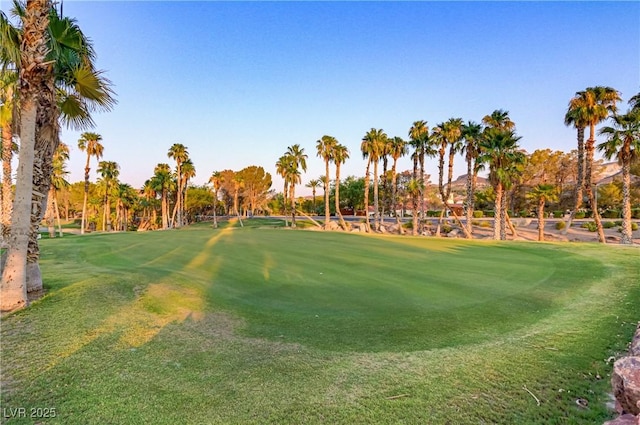 view of property's community featuring view of golf course