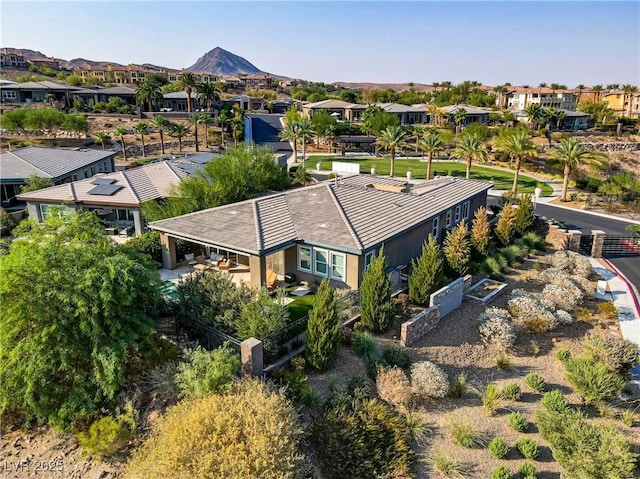 birds eye view of property featuring a residential view and a mountain view