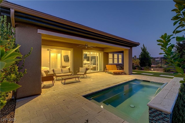 view of pool with ceiling fan, an outdoor hangout area, an in ground hot tub, fence, and a patio area