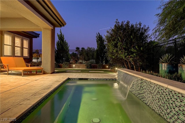 view of pool featuring a patio area, a fenced backyard, and a fenced in pool