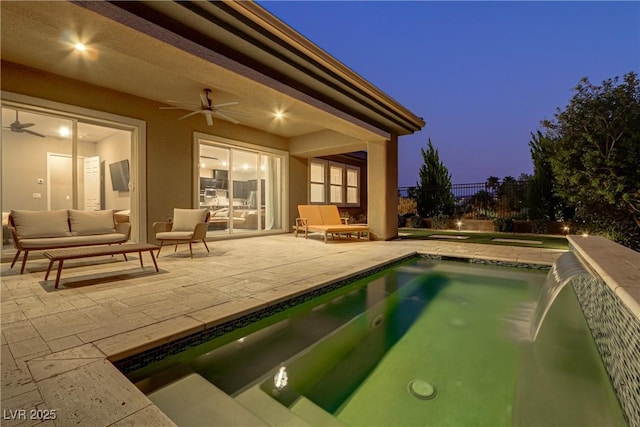 view of swimming pool featuring a ceiling fan, a patio area, fence, and outdoor lounge area