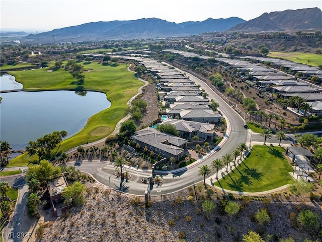 birds eye view of property featuring a residential view and a water and mountain view