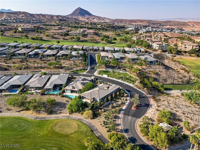 drone / aerial view with a residential view and a mountain view