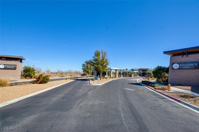 view of street with curbs