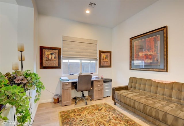 office area with recessed lighting, baseboards, visible vents, and light wood finished floors