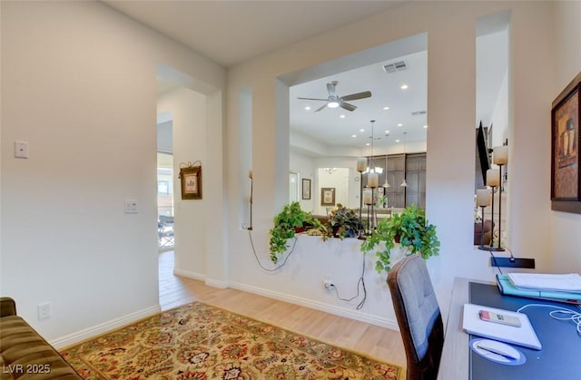 entrance foyer featuring recessed lighting, visible vents, ceiling fan, wood finished floors, and baseboards