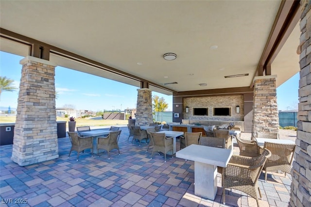 view of patio featuring outdoor lounge area, visible vents, and outdoor dining area