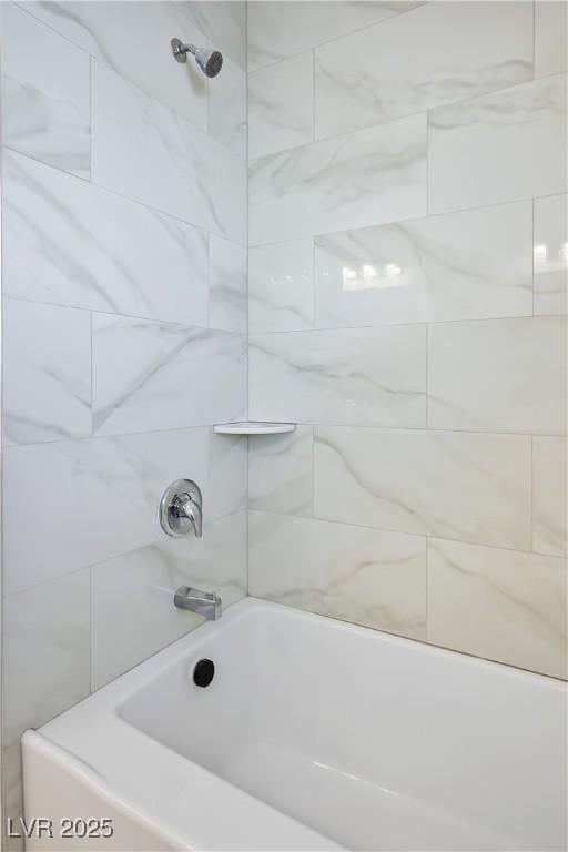 bathroom featuring shower / washtub combination