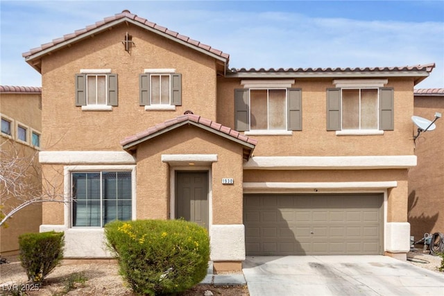 view of front facade featuring a garage, a tile roof, driveway, and stucco siding