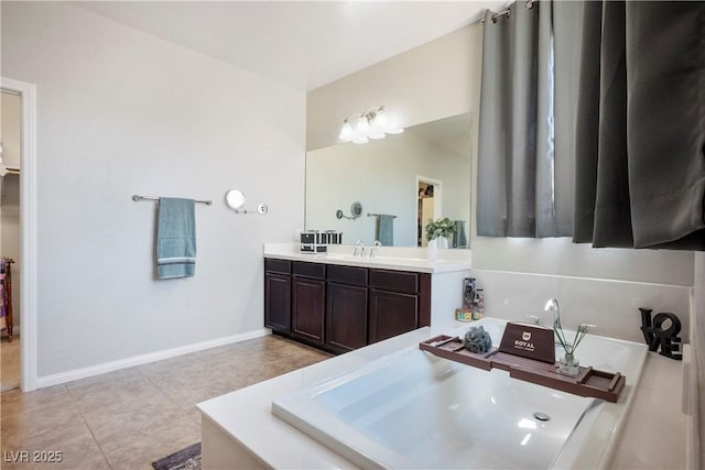 full bathroom featuring tile patterned flooring, vanity, and baseboards